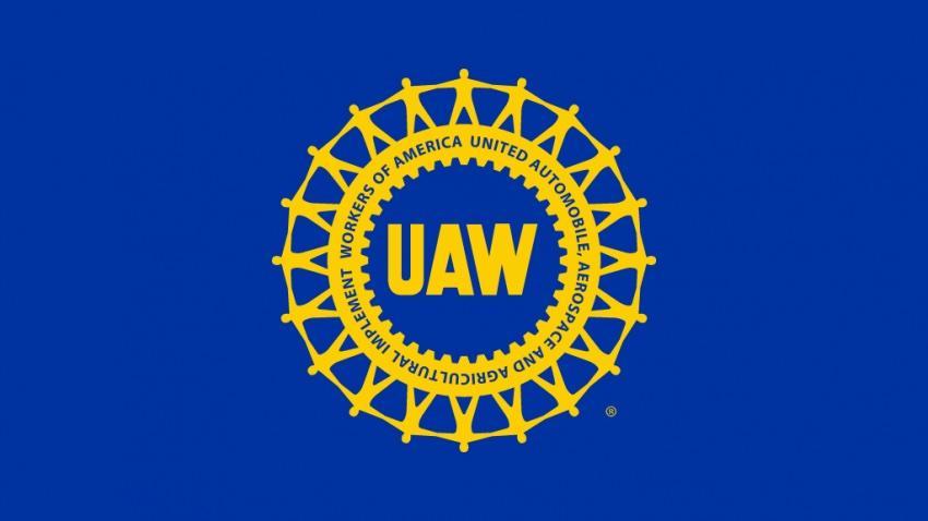 Blue banner with yellow UAW wheel logo
